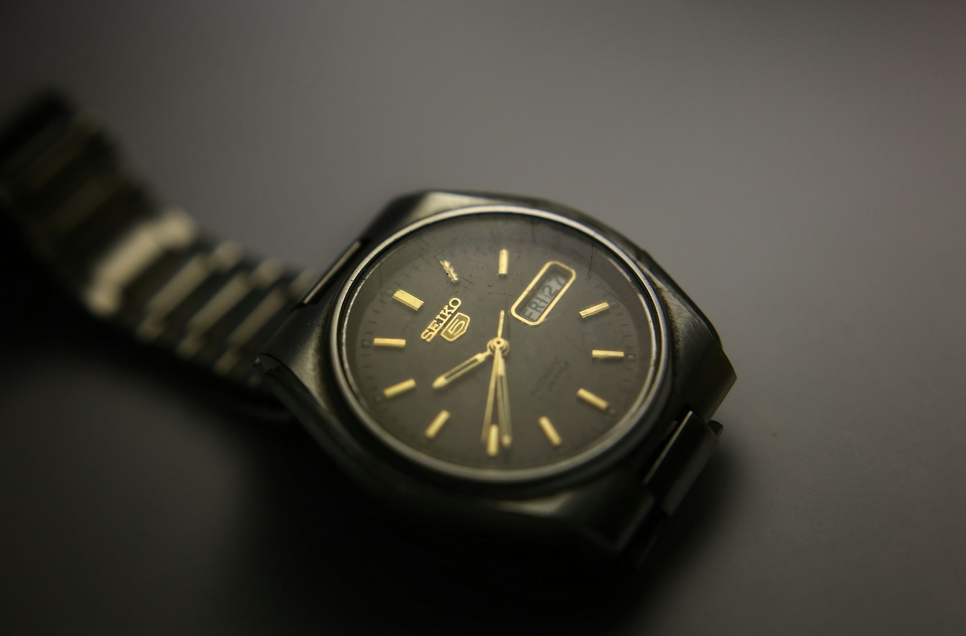 A close up of a watch on a table